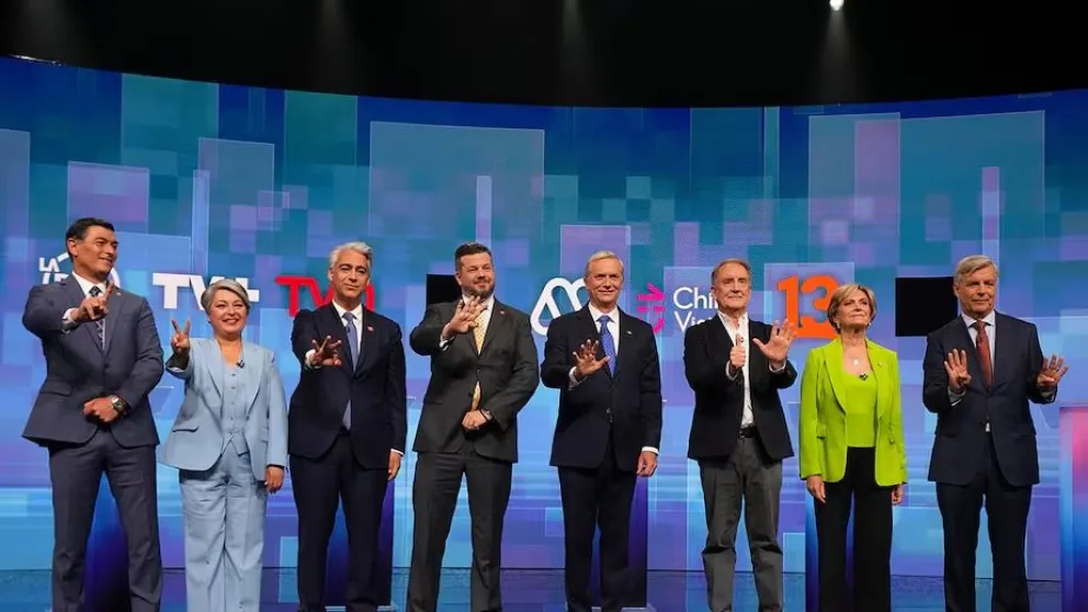 Los ocho candidatos que competirán por la presidencia de Chile (AP Photo/Esteban Felix)